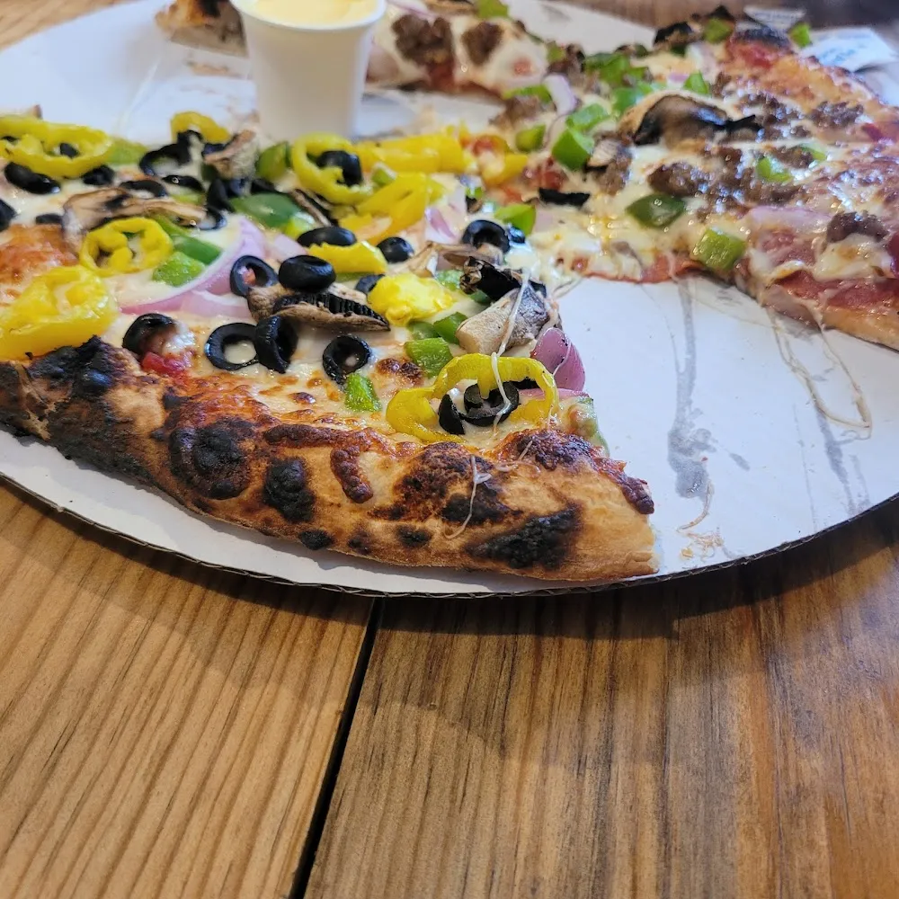 Half Supreme Half Veggie Pizza